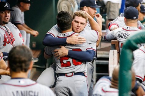 Sorry, Dan-O, I won't miss you, but everybody gets a hug. (Photo by Brian Garfinkel/Getty Images)